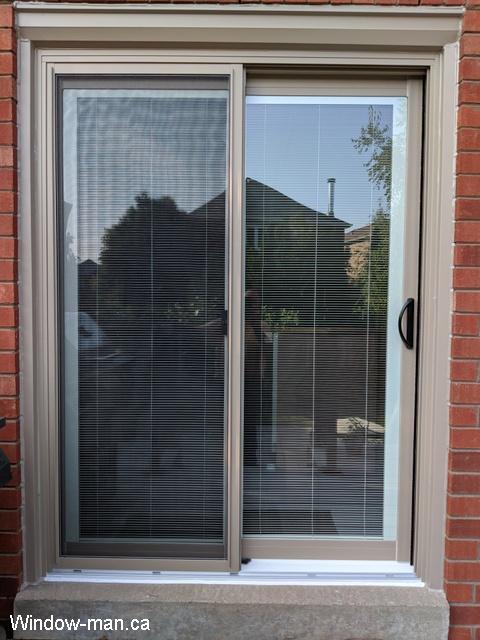5 Five foot Sliding patio doors with blinds. Low e coating, Argon gas. Sandalwood. Tilt and lift internal Mini Blinds. Installed by an independent contractor